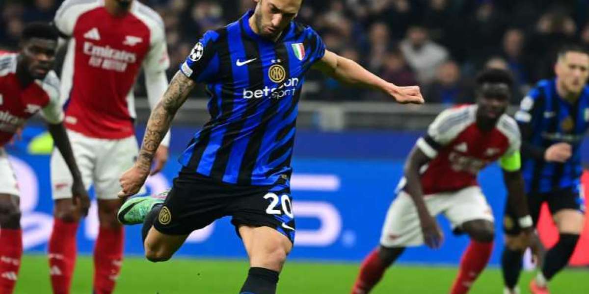 Arsenal gikk på sitt første tap i Champions League-gruppespillet, 0-1 til Inter Milan